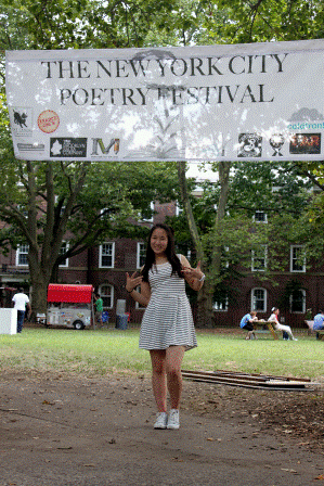 In front of the NYCPF2013 official banner on my way in to the festival!!