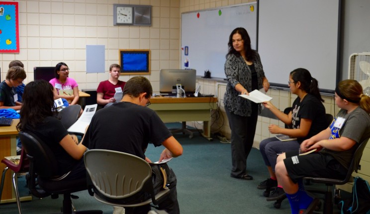 Lise Erdrich leads a flash fiction writing workshop for students at Turtle Mountain Middle School