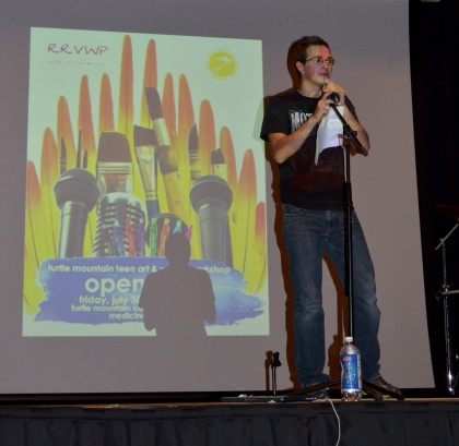 Rick Belgarde reads his work at the open mic, which was emceed by Navajo slam poet Hannabah Blue