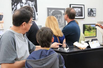 Attendees at the opening exhibition of Gold and Silver Key works ffrom the Palm Beach Art Region